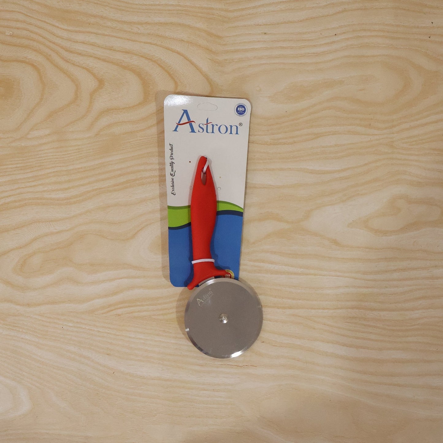 Close-up of sharp stainless steel pizza cutter blade