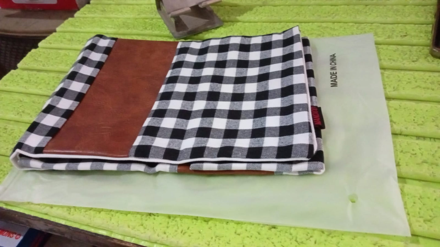 Detailed view of the durable and soft fabric of the leather and cotton pillow cover.