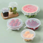 Set of 6 clear silicone stretch lids neatly stacked, showcasing their flexible design.