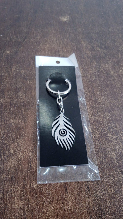 Stainless steel keychain with intricate peacock feather motif
