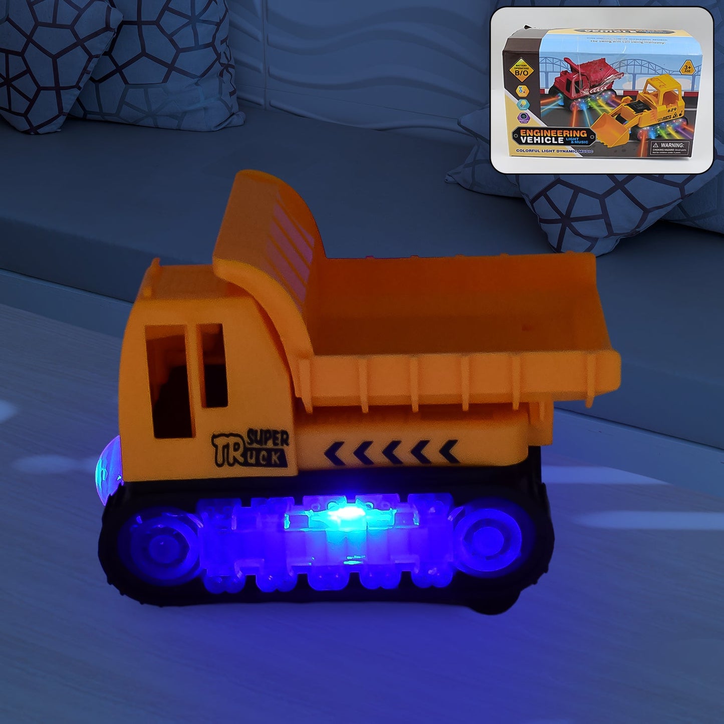 A vibrant yellow self-driving dump truck toy for kids with lights on a white background.