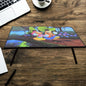 A vibrant cartoon-printed kids study table with foldable legs, perfect for learning and play.