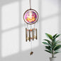 Lord Ganesh Wind Chimes hanging outdoors with vibrant traditional colors