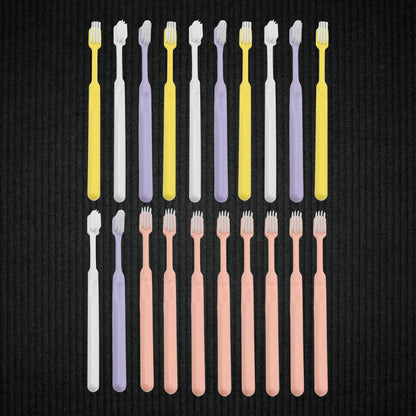 Detailed view of the ultra-soft bristles on a plastic toothbrush, designed for gentle yet effective cleaning.