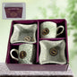 Elegant ceramic tea cup set with matching snack bowls, ideal for serving beverages and treats.