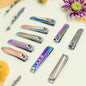AuriGlam folding nail clippers made from stainless steel, with a sleek, portable design.