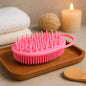 Silicone soft bristle bath brush showcasing dual cleansing and massage sides