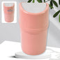 Mini Dustbin with lid on a clean wooden desk, ready for small waste.