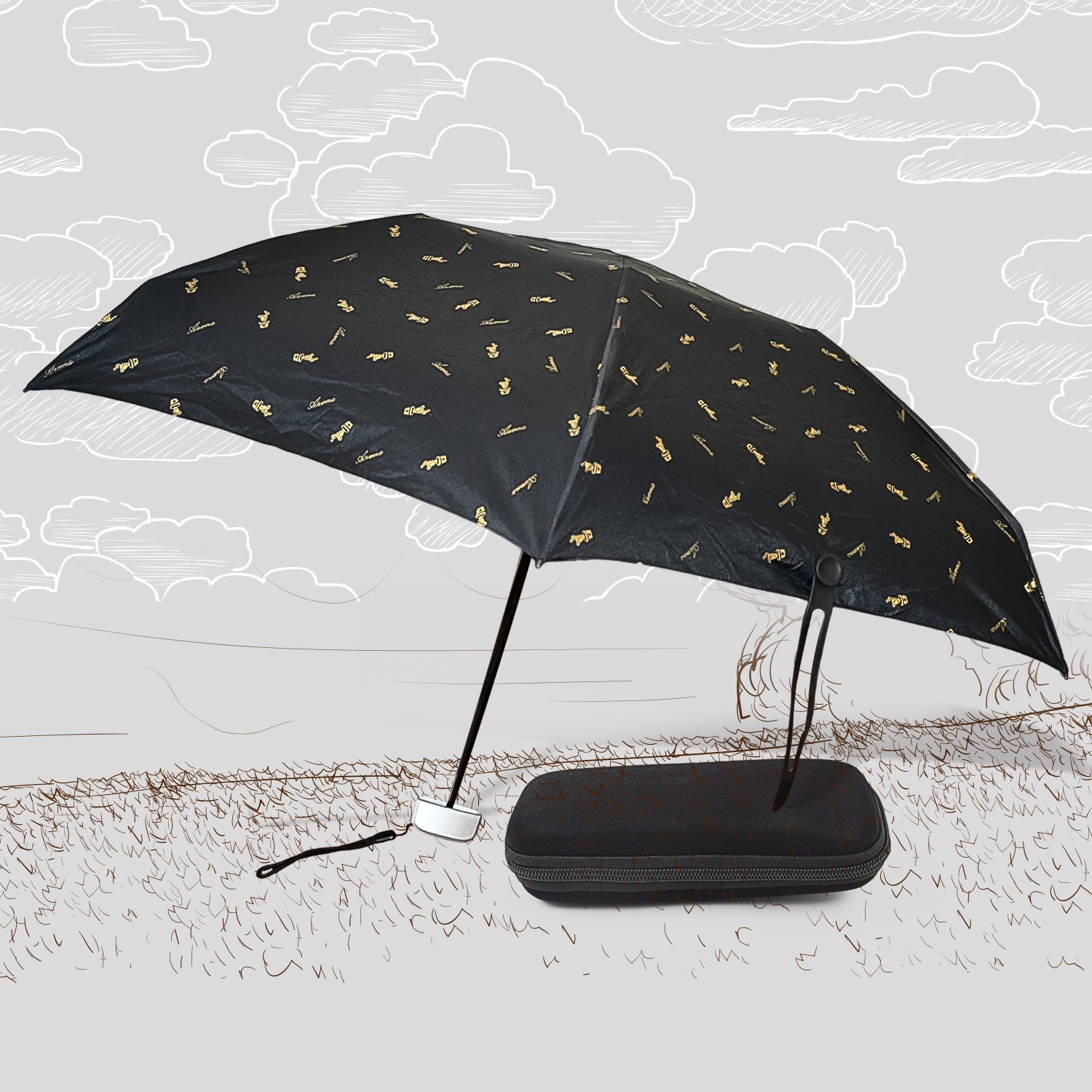 A black DrizzlePro umbrella with small gold musical note patterns is open next to its black zippered case on a sketched