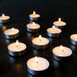 A collection of smokeless tealight candles arranged for festive home decor.