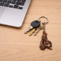 Bal Krishna Makhan Chor keychain with intricate antique gold metal finish
