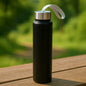 Portable stainless steel water bottle in matte finish with carry strap