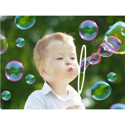 Clear bottle of Bubble Gun Liquid Refill, showing transparent bubble solution.
