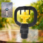 Plastic rotating sprinkler nozzle providing wide garden coverage.