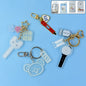 Acrylic and metal keychain featuring a microphone design