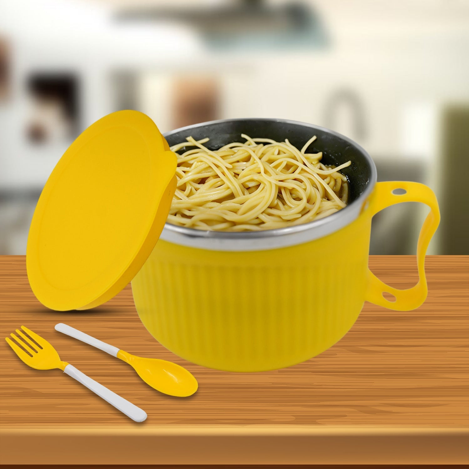 Lifestyle shot of the steel Maggie Bowl with Lid, filled with hot noodles for a cozy meal.