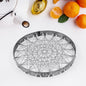 Indo Glow Chota Tandoor Grill jalli placed on a gas stove burner, ready for use.