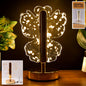 Crystal LED table lamp with butterfly-shaped acrylic shade and golden flakes