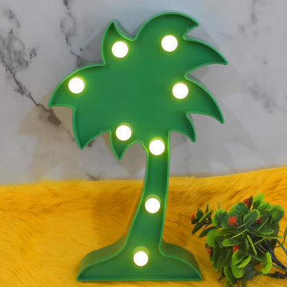 The Coconut Tree LED Lamp placed on a table, creating a romantic atmosphere in a home setting.