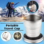 Folding camping cup with keychain, folded on a white background, showcasing its compact size.