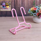 Multi-function shoe rack stand with integrated drying hanger in a modern home setting.