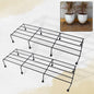 Metal rectangle flower plant stand displaying potted plants on a balcony