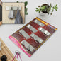 Durable stainless steel self-adhesive wall hook for kitchen organisation.