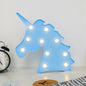 Unicorn LED Decorative Night Light with soft warm glow on table