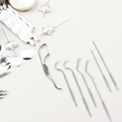 The compact AuriGlam 7-in-1 dental hygiene kit with all tools visible.