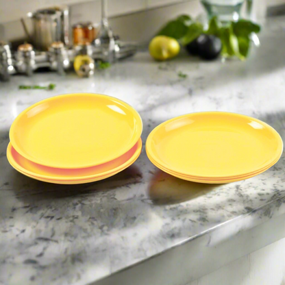Set of six stackable mini soup plates on a kitchen counter.