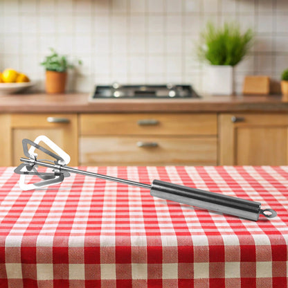 Konvex stainless steel hand push mixer actively whisking eggs in a bowl, demonstrating its efficient blending action.