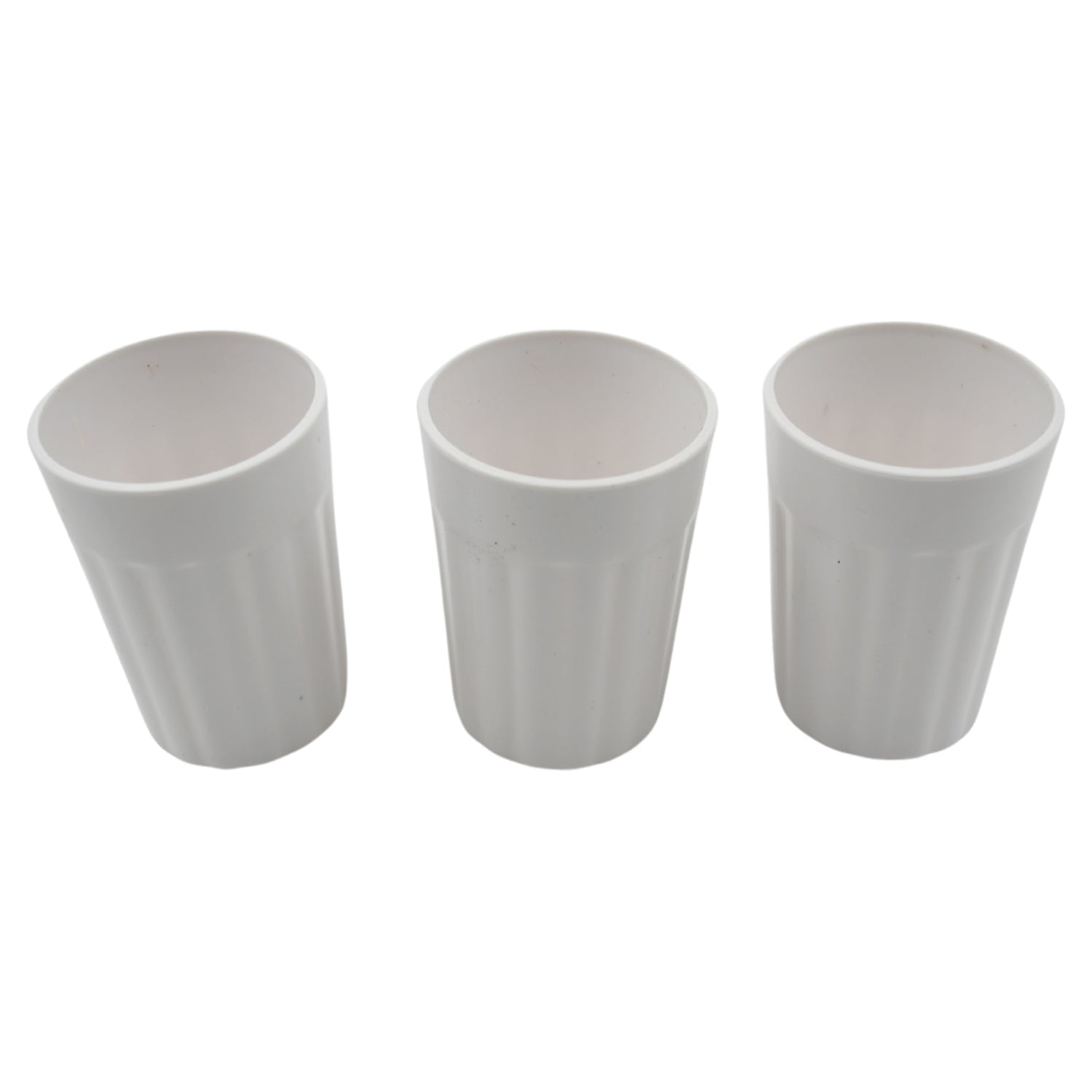 Multiple small plastic coffee and tea cups arranged for display.