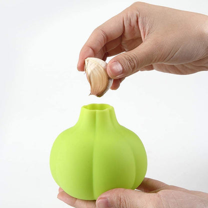 Kitchen tool: a versatile silicone peeler designed for quick garlic and ginger prep.