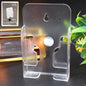 Wall Mount Mobile Holder in sleek black, presented front view.