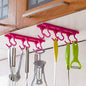 Pink multi-purpose hanging organizer with 6 durable hooks for organizing keys and utensils