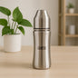 Ganesh 250ml stainless steel baby bottle with anti-colic nipple, ideal for infants.