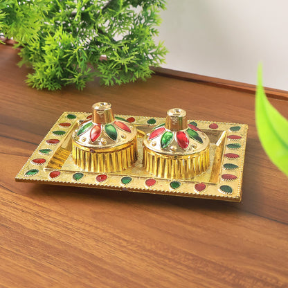 Close-up of the durable plastic pooja thali showcasing its traditional design.