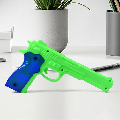 Side view of the Aditi toy gun, ready for play.