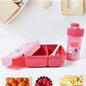 A vibrant yellow leak-proof lunch box with a matching water bottle and fork, ready for a meal.