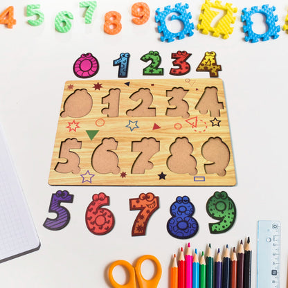 Wooden puzzle board displaying animal-shaped pieces with knobs