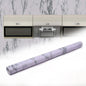 Roll of marble kitchen wallpaper with realistic white and grey pattern