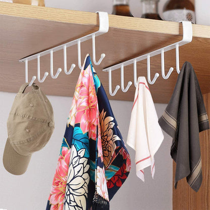 Under-shelf metal rack organizing kitchen utensils and tools