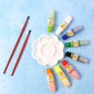 Watercolor paint set showcasing 8 vibrant colors with brushes and palette