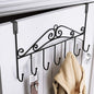 Over Door Hanger Rack with 7 hooks, displayed empty on a white door.