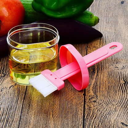 Close-up of the durable plastic spatula with holder, a versatile kitchen tool.