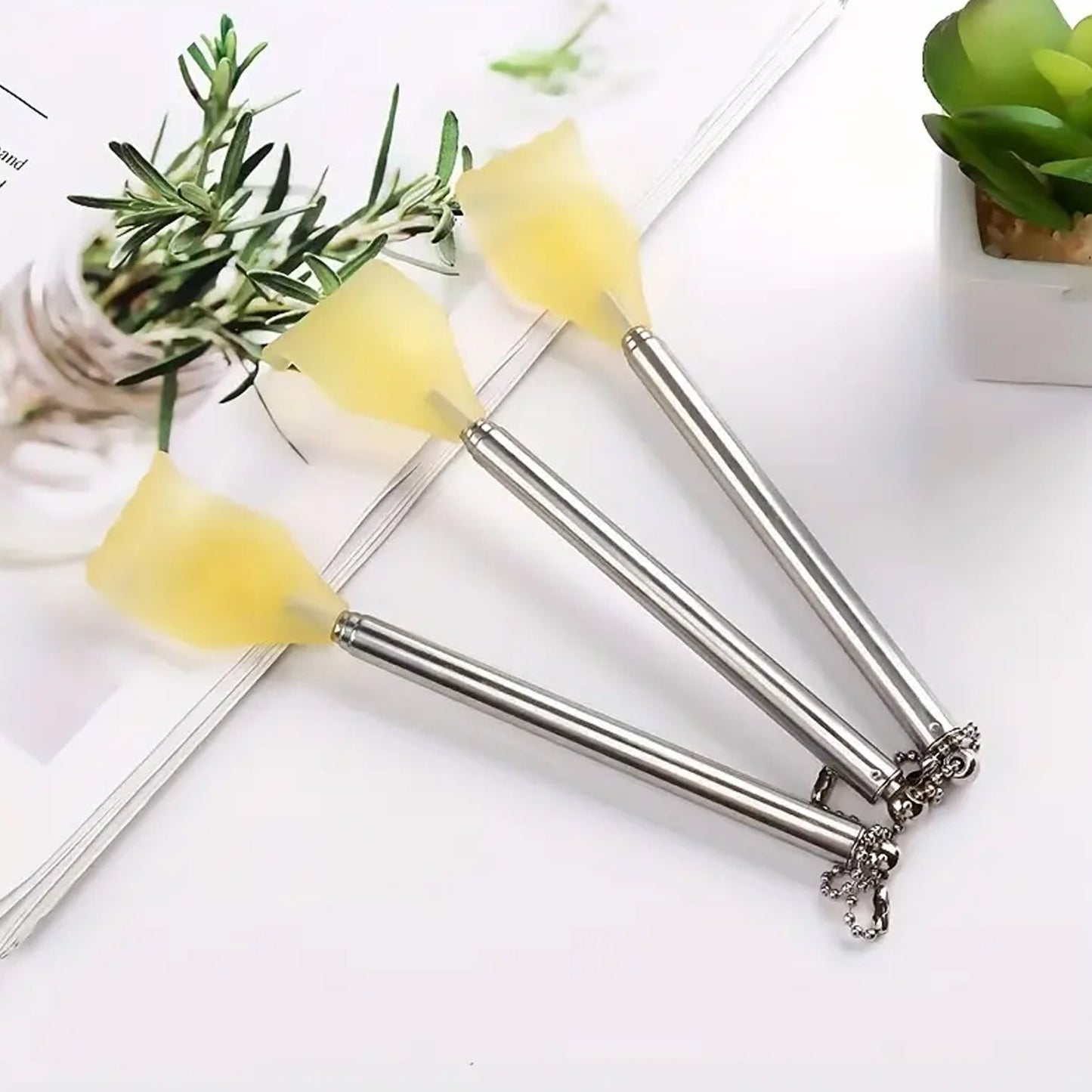 The telescoping back scratcher in its compact, folded state for easy storage.