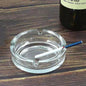 Elegant round crystal glass ashtray, perfect for modern home decor.