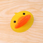 Heat resistant silicone hot pot holder clip securely gripping hot pot handle