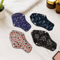 Set of reusable cloth sanitary pads in assorted prints providing eco-friendly menstrual protection