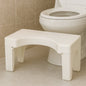 Foldable plastic toilet squat stool with anti-slip strips for safe use.